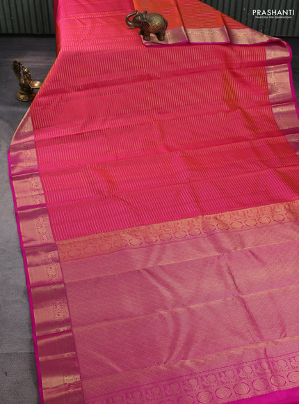 Pure kanchipuram silk saree dual tone pinkish orange and pink with allover zari stripe pattern and rich zari woven border