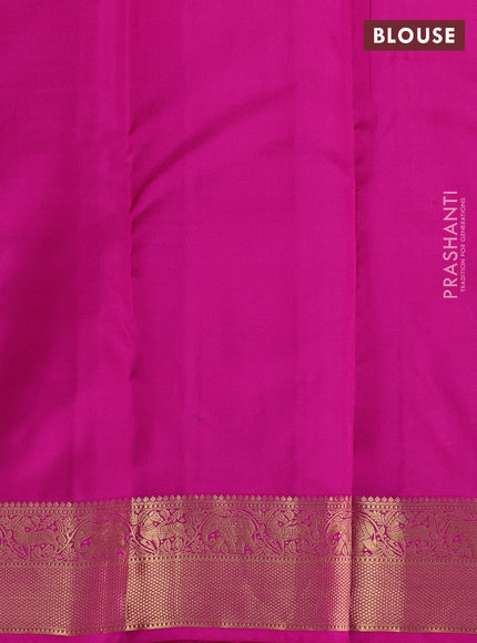 Pure kanchipuram silk saree dual tone pinkish orange and pink with allover zari stripe pattern and rich zari woven border