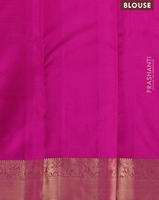 Pure kanchipuram silk saree dual tone pinkish orange and pink with allover zari stripe pattern and rich zari woven border
