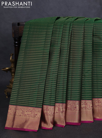 Pure kanchipuram silk saree green and magenta pink with allover zari stripe pattern and rich zari woven border