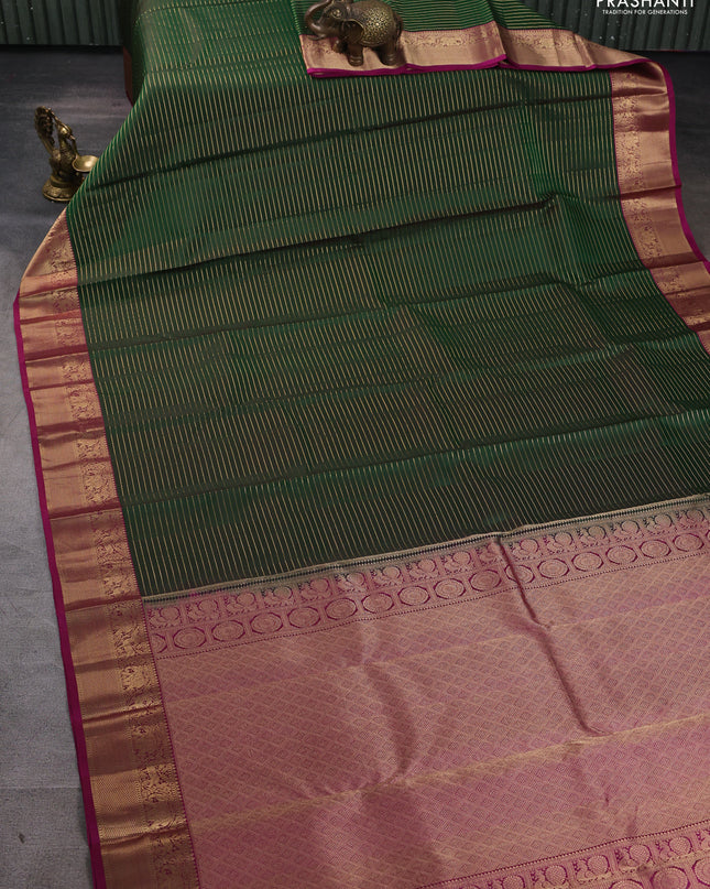 Pure kanchipuram silk saree green and magenta pink with allover zari stripe pattern and rich zari woven border