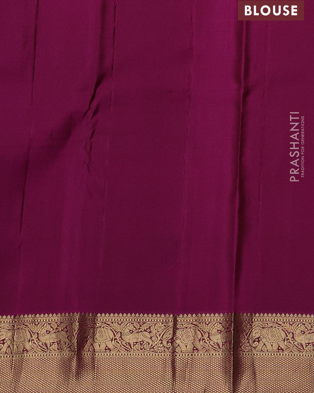 Pure kanchipuram silk saree green and magenta pink with allover zari stripe pattern and rich zari woven border