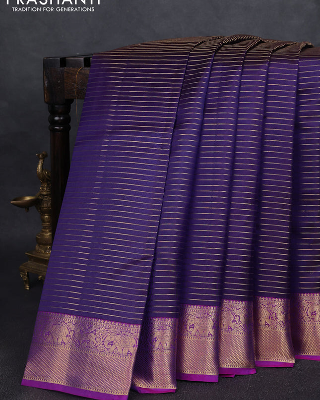 Pure kanchipuram silk saree violet and purple with allover zari stripe pattern and rich zari woven border