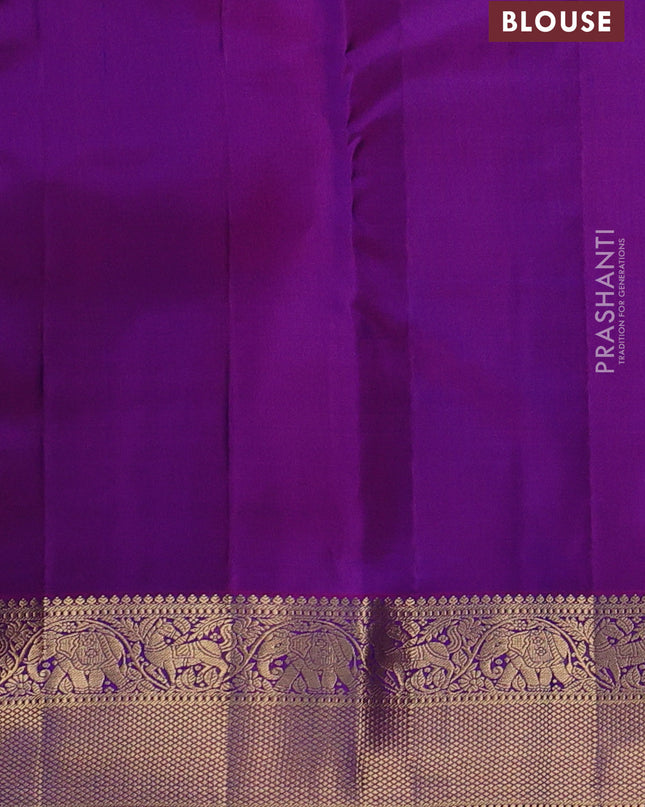 Pure kanchipuram silk saree violet and purple with allover zari stripe pattern and rich zari woven border