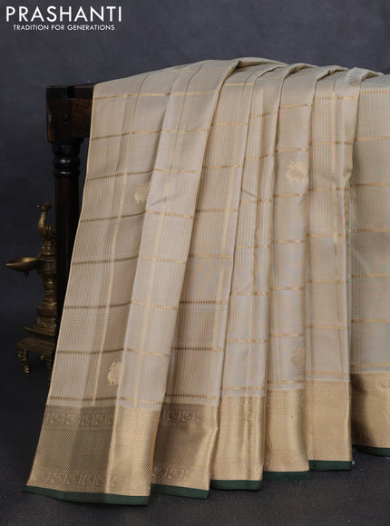 Pure kanchipuram silk saree elaichi green and green with allover zari checks & buttas and rich zari woven border