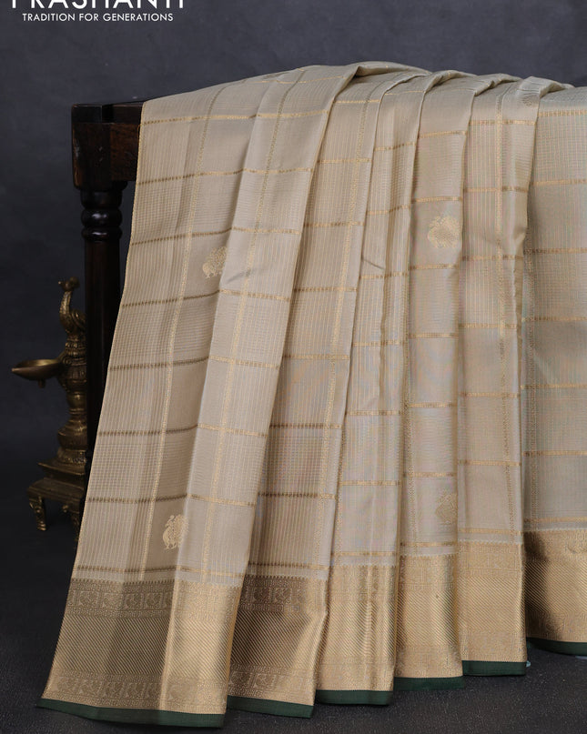 Pure kanchipuram silk saree elaichi green and green with allover zari checks & buttas and rich zari woven border