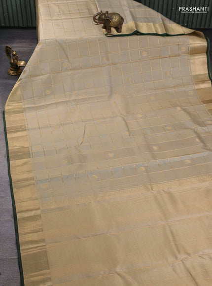 Pure kanchipuram silk saree elaichi green and green with allover zari checks & buttas and rich zari woven border