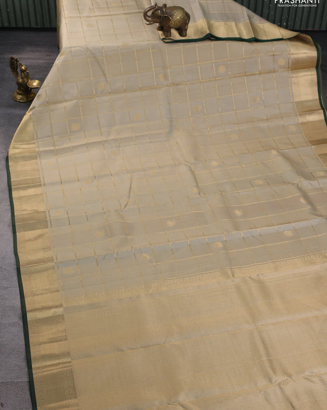Pure kanchipuram silk saree elaichi green and green with allover zari checks & buttas and rich zari woven border
