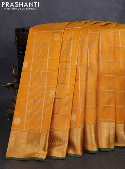 Pure kanchipuram silk saree mustard yellow and green with allover zari checks & buttas and rich zari woven border