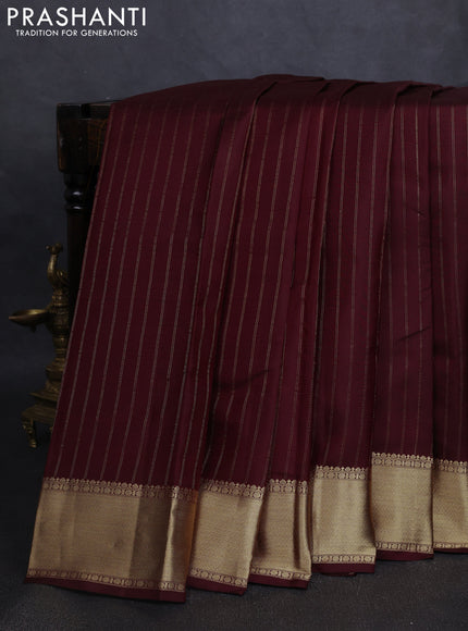 Pure kanchipuram silk saree deep maroon with allover zari stripe pattern and rich zari woven border