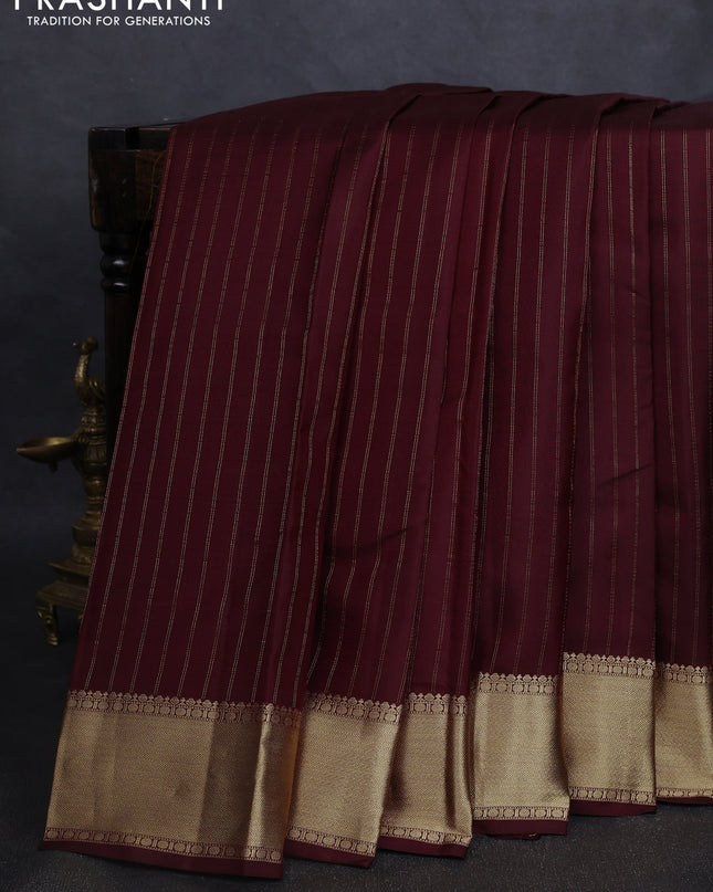 Pure kanchipuram silk saree deep maroon with allover zari stripe pattern and rich zari woven border