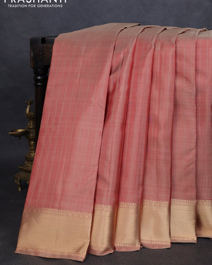 Pure kanchipuram silk saree dual tone rust with allover zari stripe pattern and rich zari woven border
