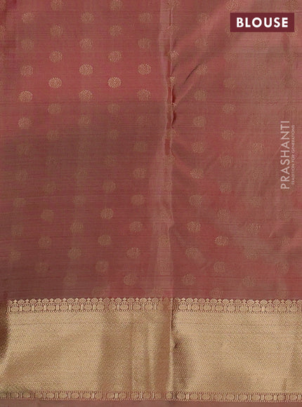 Pure kanchipuram silk saree dual tone rust with allover zari stripe pattern and rich zari woven border