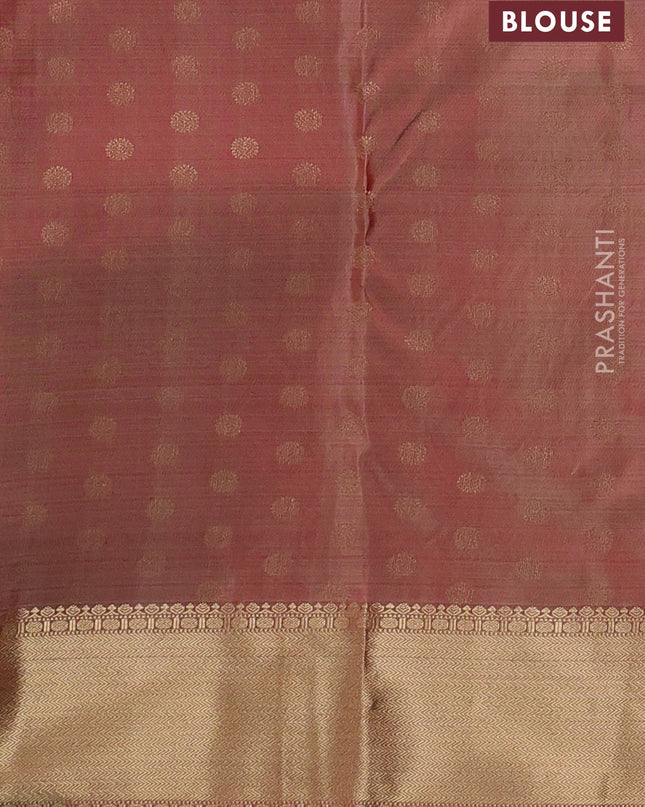 Pure kanchipuram silk saree dual tone rust with allover zari stripe pattern and rich zari woven border