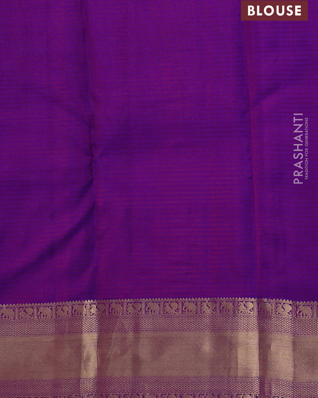 Pure kanchipuram silk saree purple with annam zari woven buttas and rich zari woven border