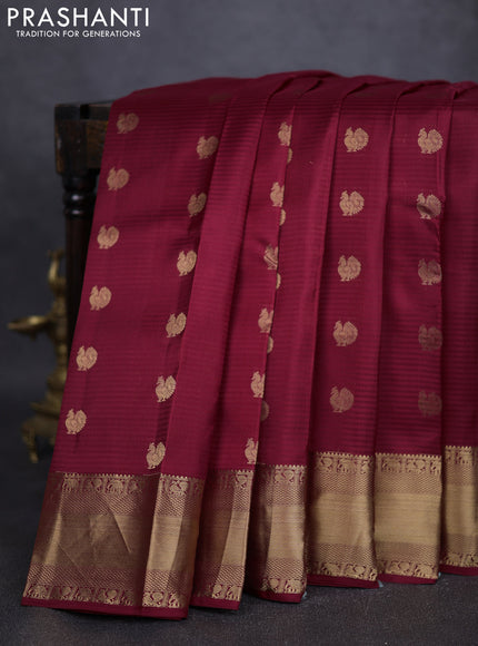 Pure kanchipuram silk saree maroon with annam zari woven buttas and rich zari woven border