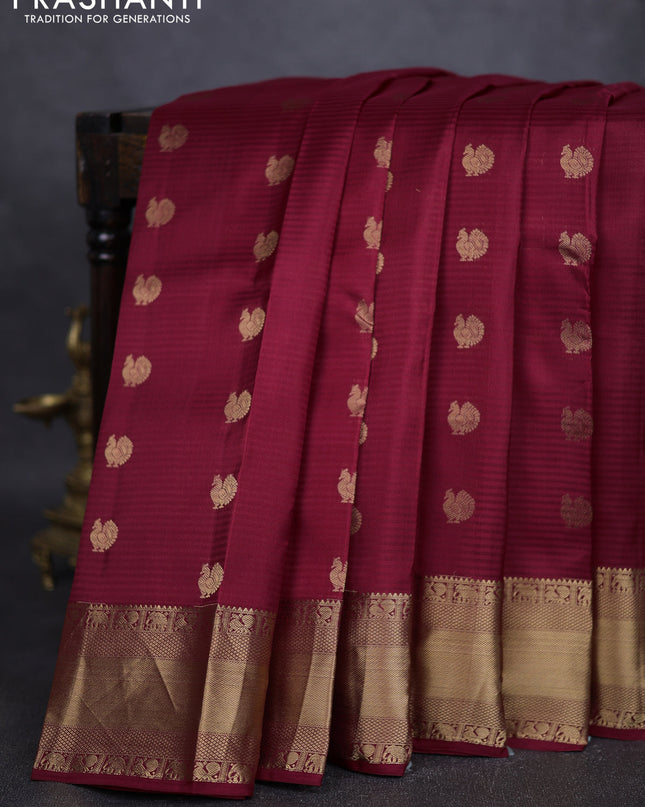 Pure kanchipuram silk saree maroon with annam zari woven buttas and rich zari woven border