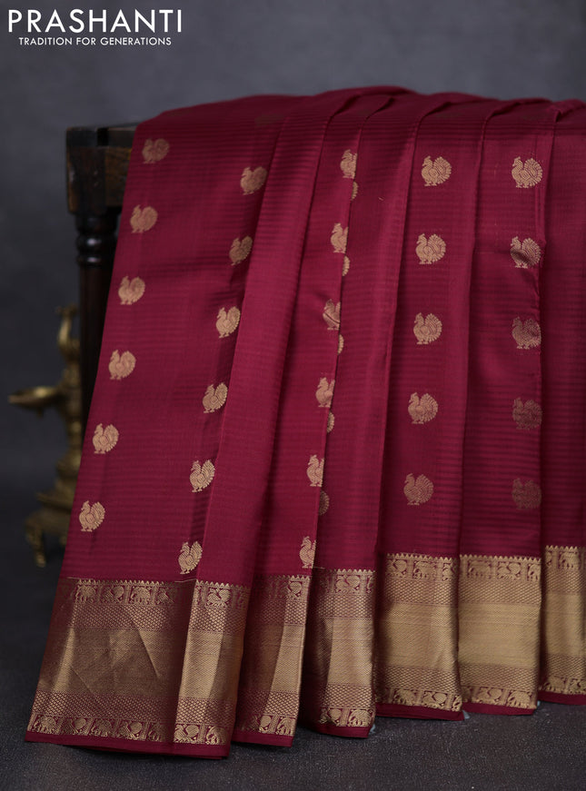 Pure kanchipuram silk saree maroon with annam zari woven buttas and rich zari woven border