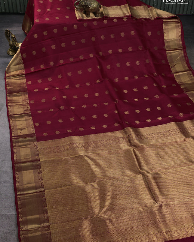 Pure kanchipuram silk saree maroon with annam zari woven buttas and rich zari woven border