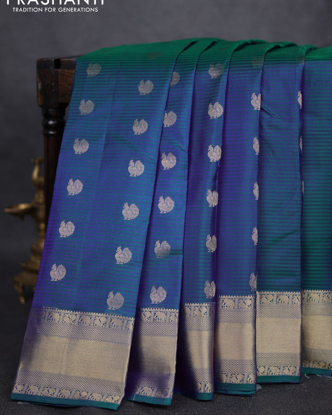 Pure kanchipuram silk saree dual tone greenish blue and green with annam zari woven buttas and rich zari woven border