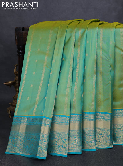 Pure kanchipuram silk saree dual tone green and teal green with allover zari weaves & buttas and rich zari woven border