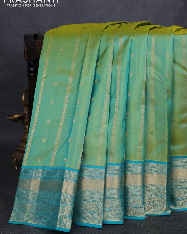 Pure kanchipuram silk saree dual tone green and teal green with allover zari weaves & buttas and rich zari woven border
