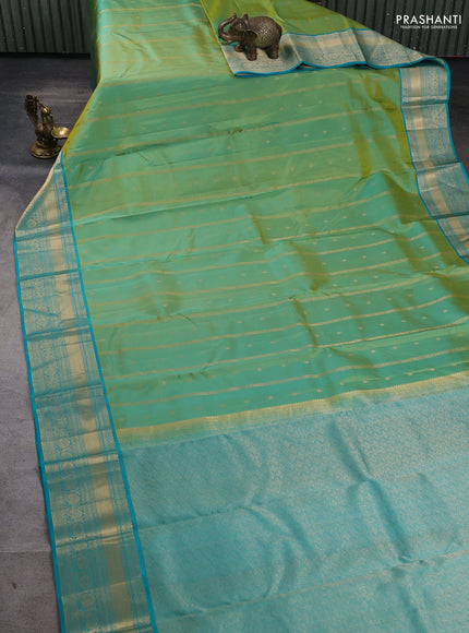 Pure kanchipuram silk saree dual tone green and teal green with allover zari weaves & buttas and rich zari woven border