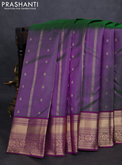 Pure kanchipuram silk saree dual tone greenish purple and dark purple with allover zari weaves & buttas and rich zari woven border