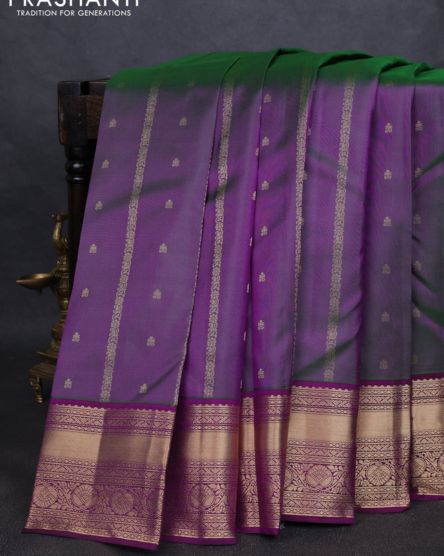 Pure kanchipuram silk saree dual tone greenish purple and dark purple with allover zari weaves & buttas and rich zari woven border