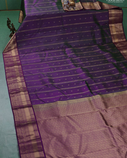 Pure kanchipuram silk saree dual tone greenish purple and dark purple with allover zari weaves & buttas and rich zari woven border