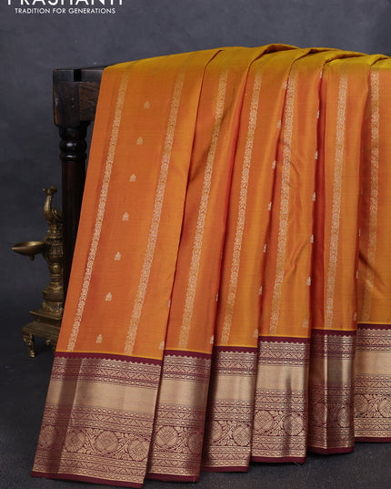 Pure kanchipuram silk saree dark mustard and deep maroon with allover zari weaves & buttas and rich zari woven border
