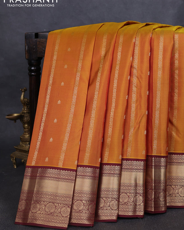 Pure kanchipuram silk saree dark mustard and deep maroon with allover zari weaves & buttas and rich zari woven border