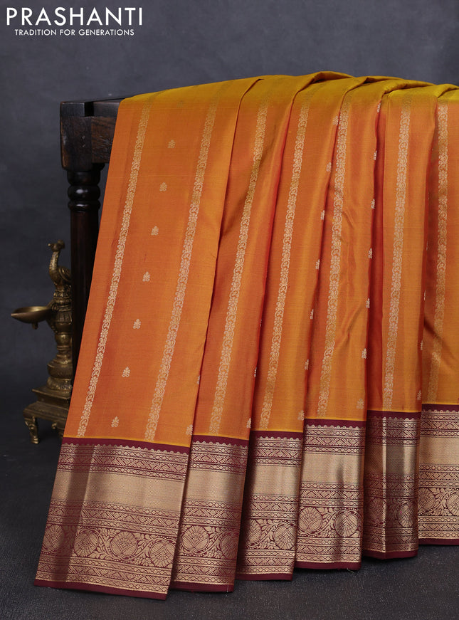 Pure kanchipuram silk saree dark mustard and deep maroon with allover zari weaves & buttas and rich zari woven border