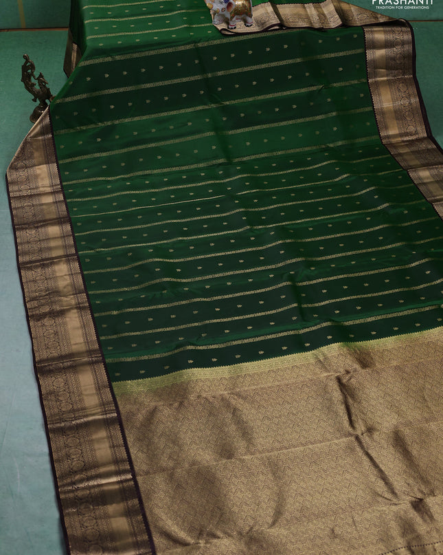 Pure kanchipuram silk saree green and coffee brown with allover zari weaves & buttas and rich zari woven border