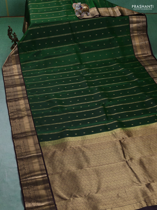Pure kanchipuram silk saree green and coffee brown with allover zari weaves & buttas and rich zari woven border