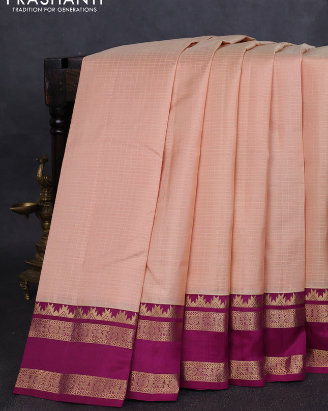Pure kanchipuram silk saree sandal and dark magenta with allover self emboss pattern and rettapet zari woven border