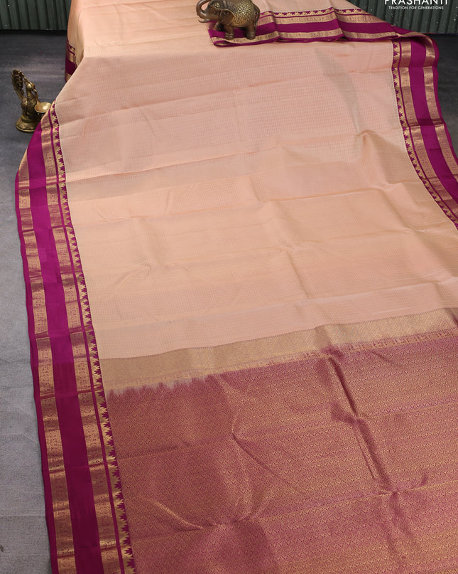 Pure kanchipuram silk saree sandal and dark magenta with allover self emboss pattern and rettapet zari woven border