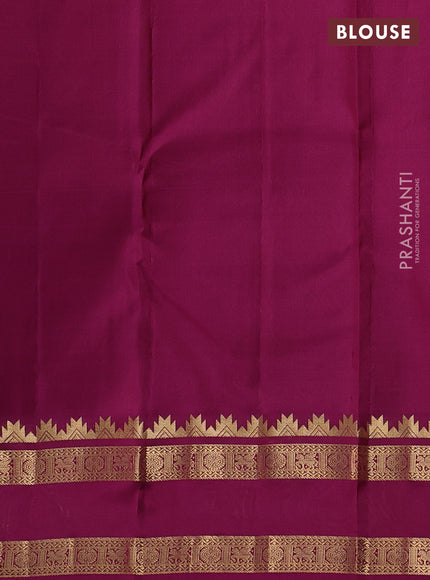 Pure kanchipuram silk saree sandal and dark magenta with allover self emboss pattern and rettapet zari woven border