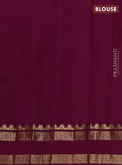 Pure kanchipuram silk saree yellow and dark magenta with allover self emboss pattern and rettapet zari woven border