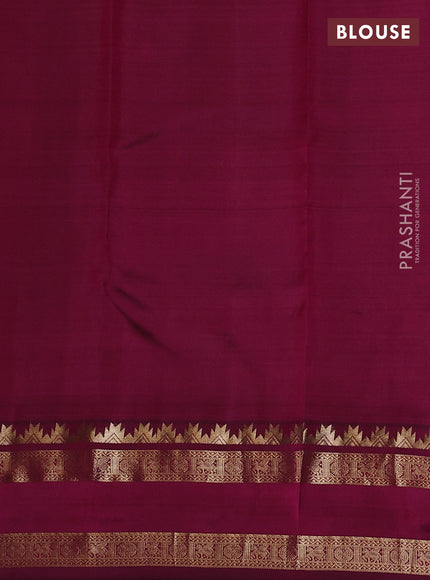 Pure kanchipuram silk saree dual tone bluish green and dark magenta with allover self emboss pattern and rettapet zari woven border