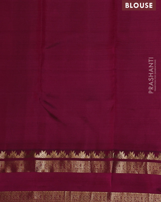 Pure kanchipuram silk saree dual tone bluish green and dark magenta with allover self emboss pattern and rettapet zari woven border