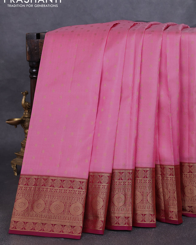 Pure kanchipuram silk saree light pink and maroon with allover zari woven 1000 buttas and temple design zari woven border