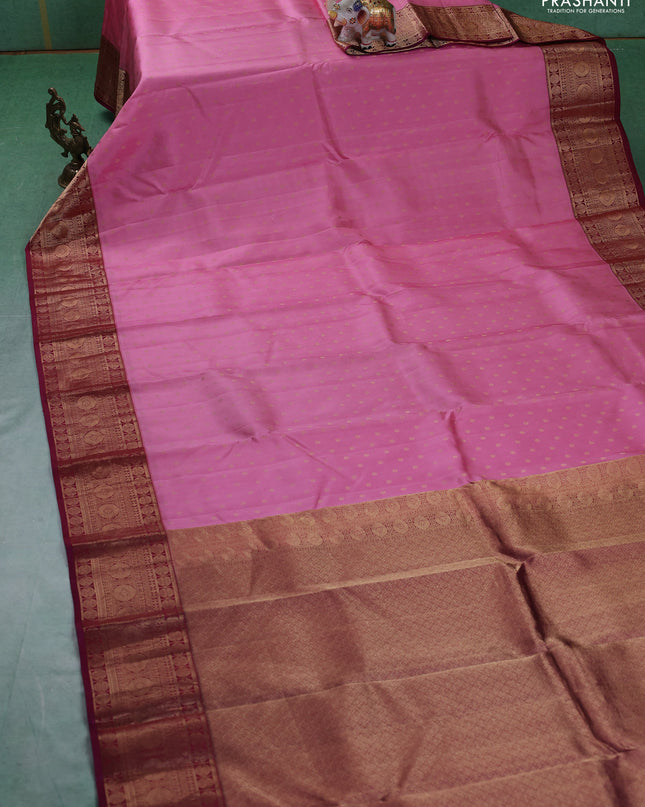 Pure kanchipuram silk saree light pink and maroon with allover zari woven 1000 buttas and temple design zari woven border