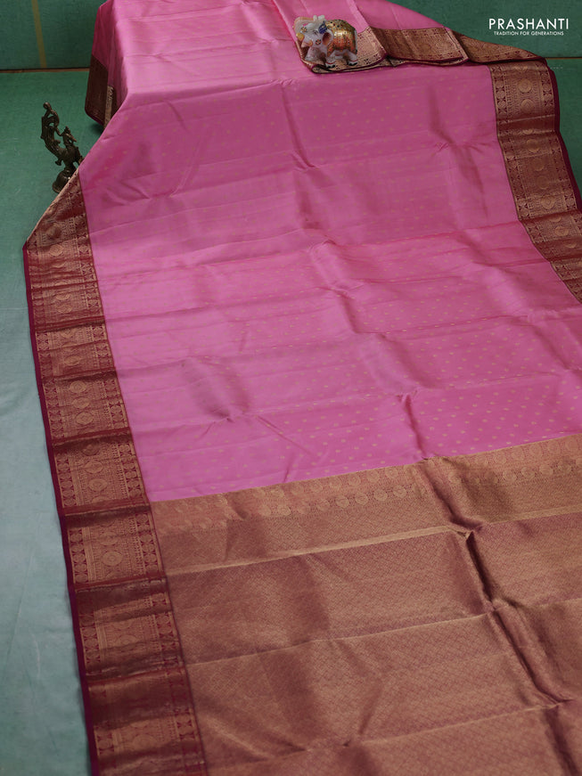 Pure kanchipuram silk saree light pink and maroon with allover zari woven 1000 buttas and temple design zari woven border