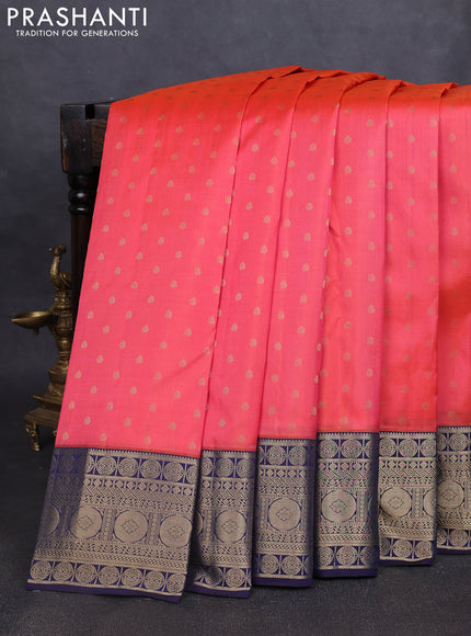 Pure kanchipuram silk saree peach shade and navy blue with allover zari woven 1000 buttas and temple design zari woven border