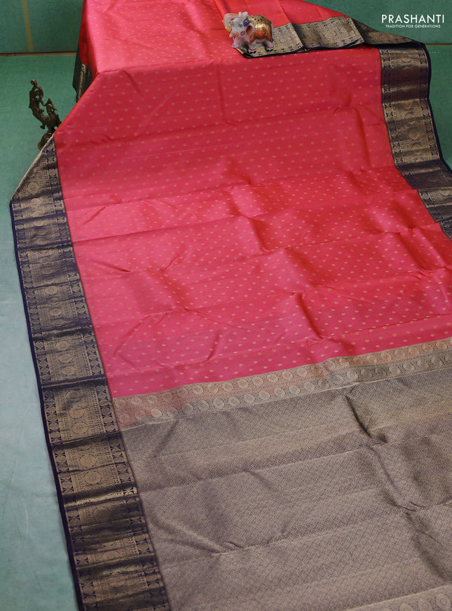 Pure kanchipuram silk saree peach shade and navy blue with allover zari woven 1000 buttas and temple design zari woven border