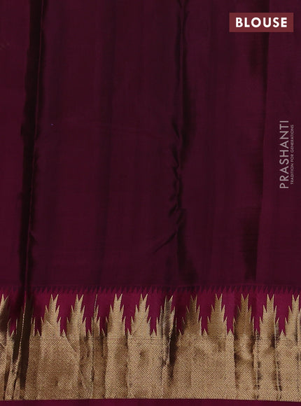 Pure kanchipuram silk saree black and magenta pink with allover zari woven 1000 buttas and temple design zari woven border