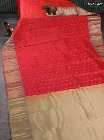 Pure kanchipuram silk saree dual tone orange and beige with allover zari woven 1000 buttas and rich zari woven border