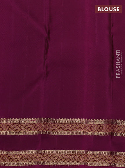 Pure kanchipuram silk saree bottle green and magenta pink with allover zari woven 1000 buttas and rettapet zari woven border