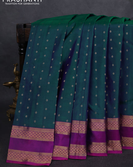 Pure kanchipuram silk saree dual tone peacock green and purple with allover zari woven 1000 buttas and rettapet zari woven border